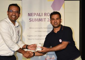 Nepali_Roots_Summit_Handshake.JPG